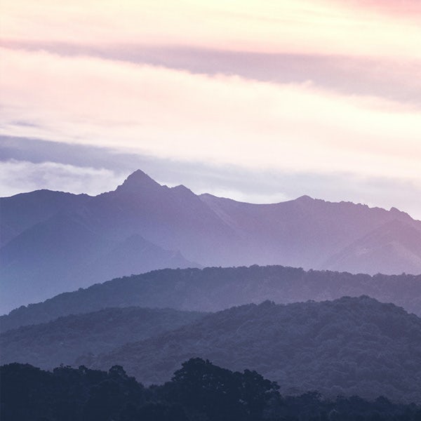 An image of a mountain range at sunset.