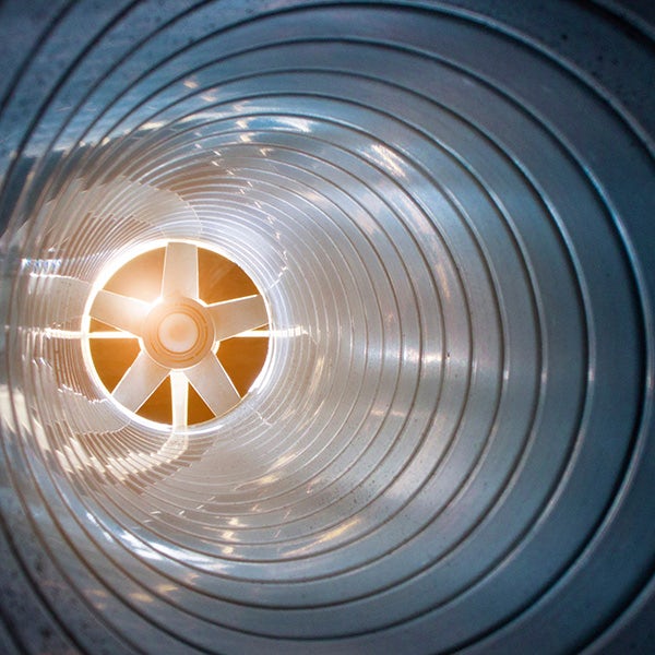 An image of a metal pipe with a light shining through it.