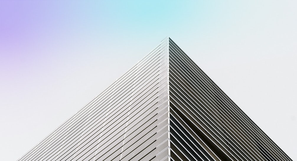 An image of a modern building with a blue sky.