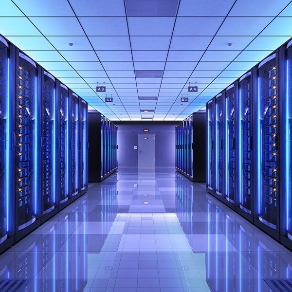 A server room with blue lights in it.