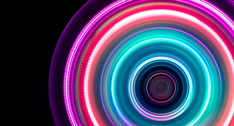 An image of a colorful light wheel on a black background.