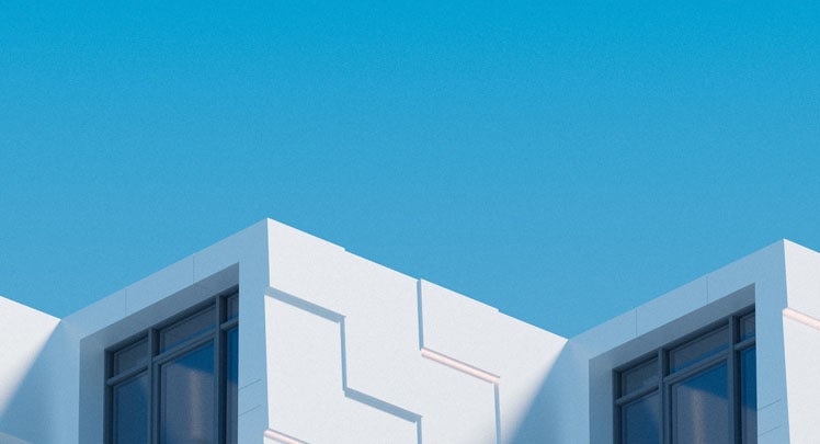 An illustration of a white building against a blue sky.