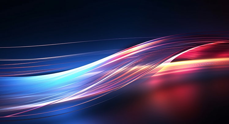 An abstract image of a light wave on a dark background.
