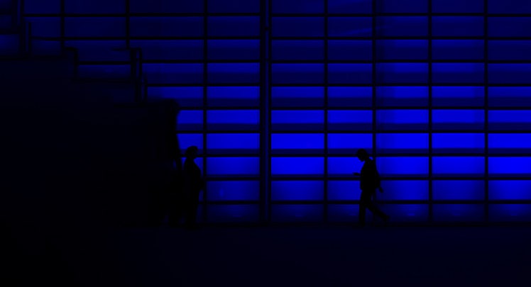 A blue glass wall.