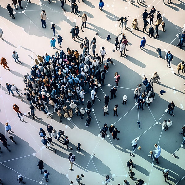 An aerial view of a group of people in a city.