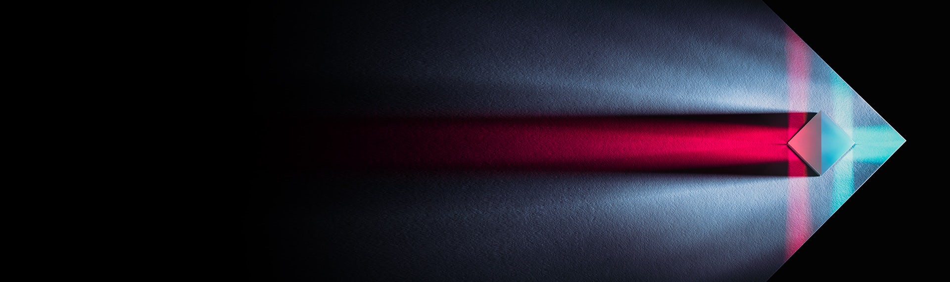 An image of a red and blue light coming out of a dark room.