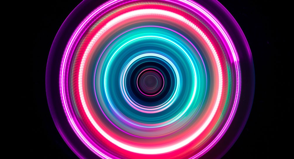 An image of a colorful circle on a black background.