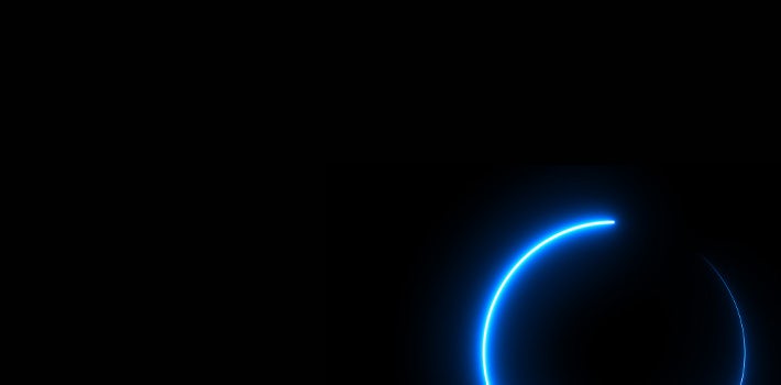 An image of a blue light shining on a black background.