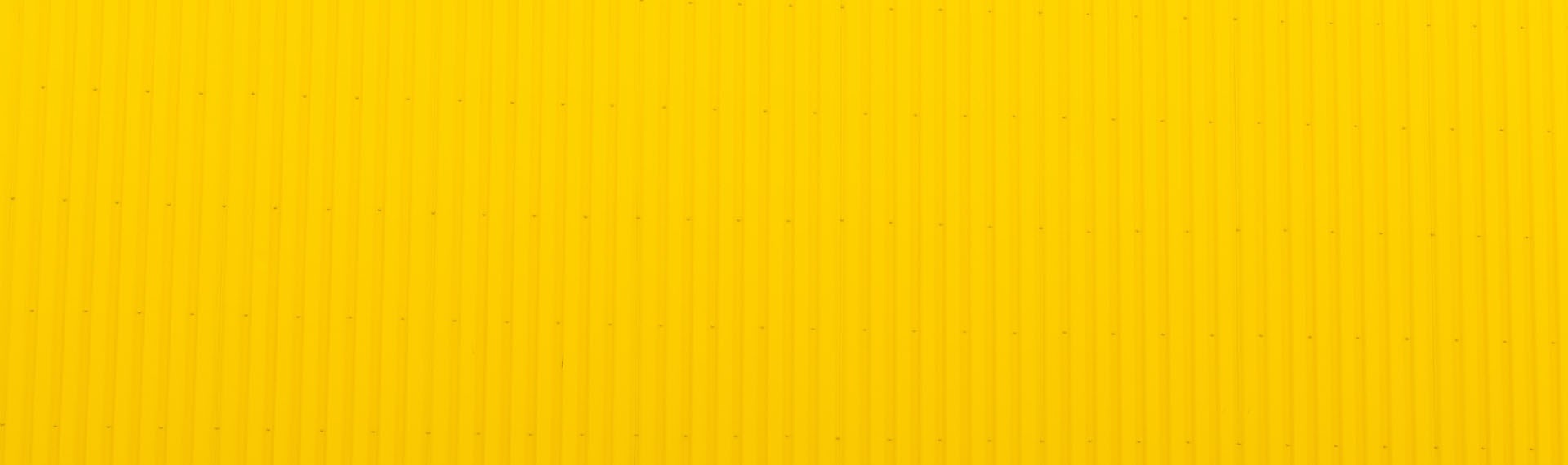 yellow-wall-unsplash-ij25m7fxqtk-cta-banner