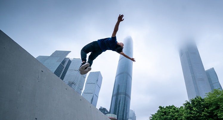 young-parkour-flips-through-city-getty-1388682646-teaser