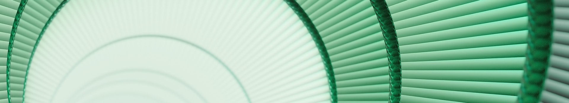 A green abstract background with a circular shape.